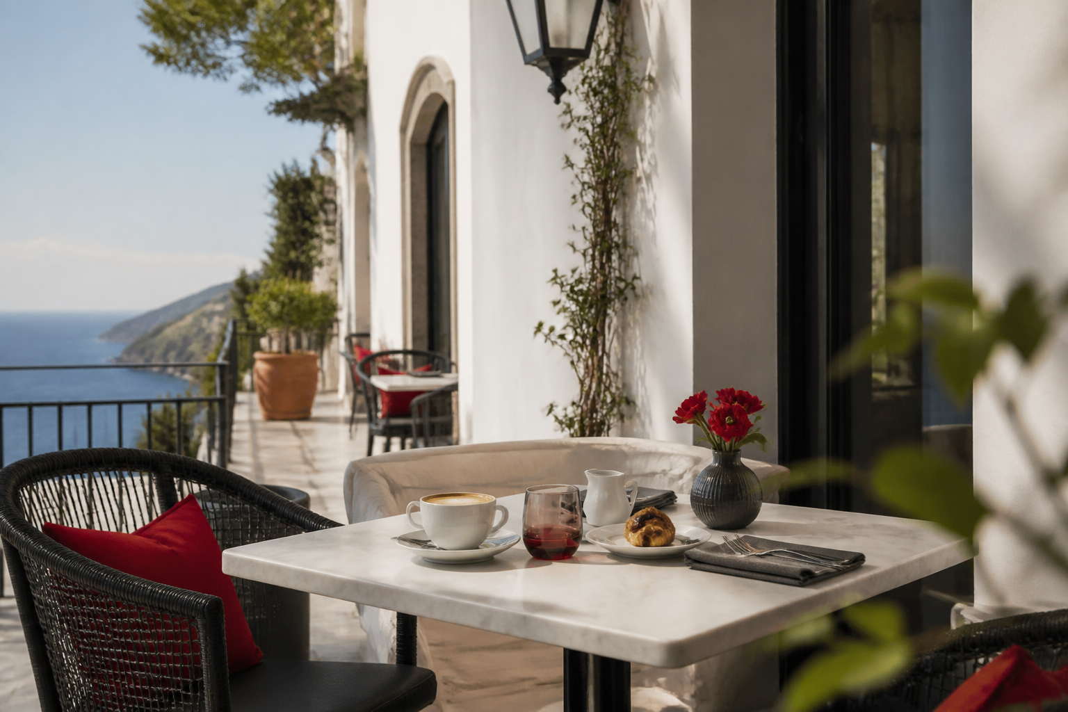 Cafe terrace overlooking a coastal travel destination